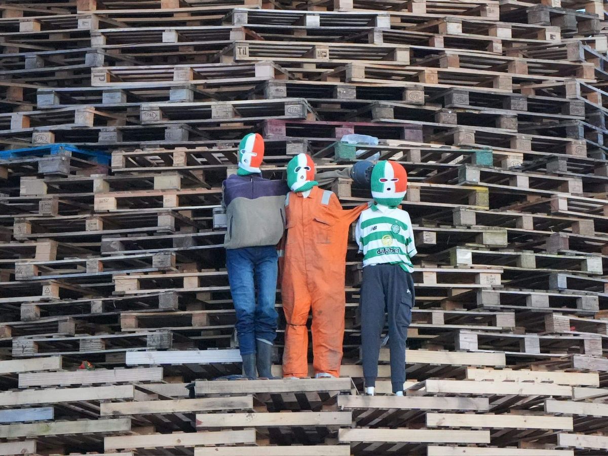 Effigies of Kneecap, Irish flags and sectarian slogans top loyalist bonfires