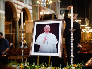 A picture of Pope Francis on display in Westminster Cathedral in Victoria, London