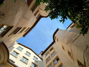 The view looking up from one of Lyon's traboules, the many passageways linking the city's old thoroughfares