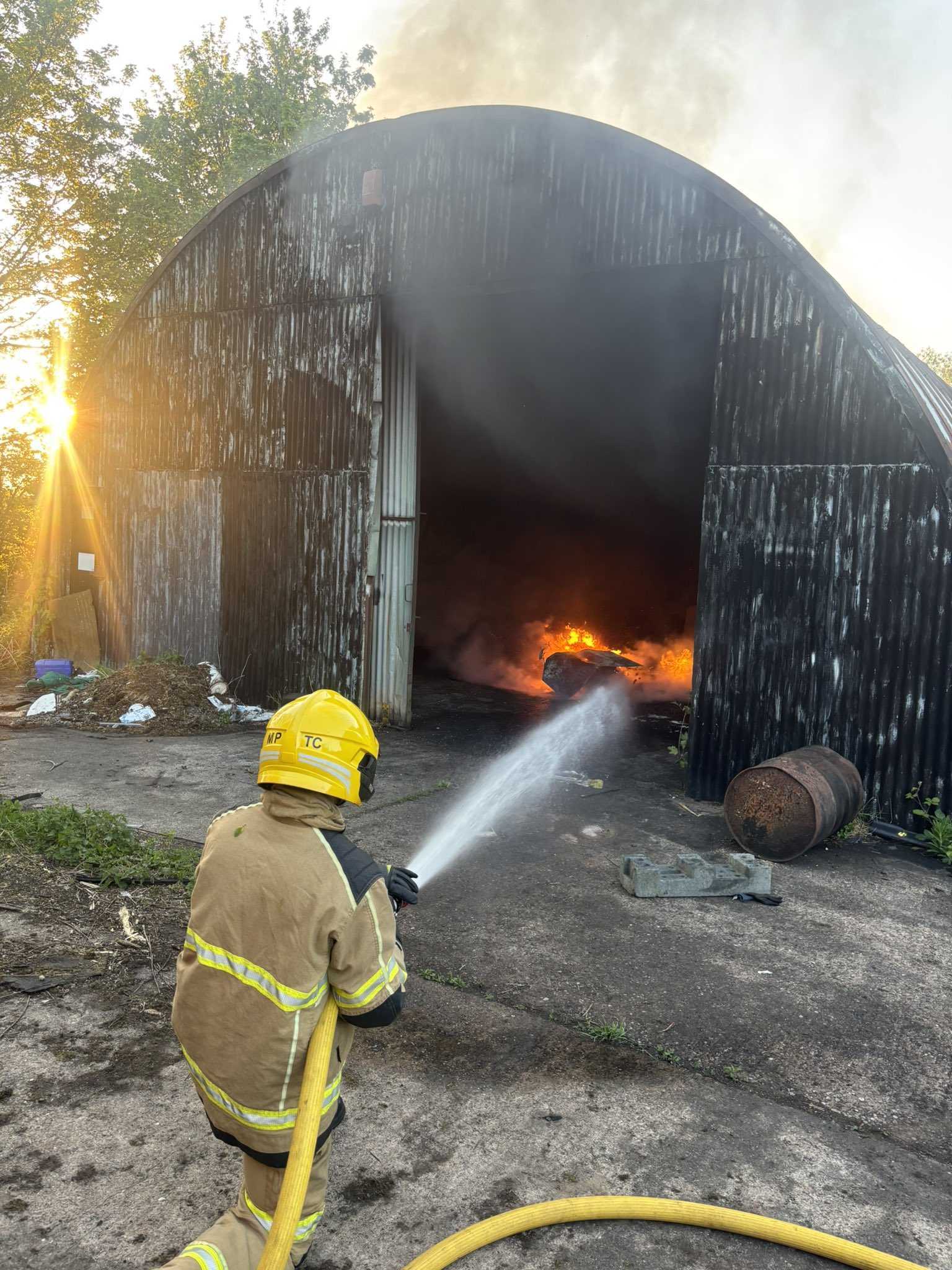 Firefighters tackle the third fire in less than a week at the vacant site. Photo: Craig Jackson/SFRS