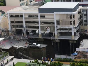 Supporting image for story: Large sinkhole created as road collapses in Bangkok