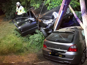 Supporting image for story: Car brings telegraph pole down onto vehicle's roof in crash near Dudley