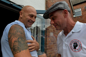 It's in the blood: Mark Humpage shows Stewart Lees his soul tattoo - both men are from Walsall.
