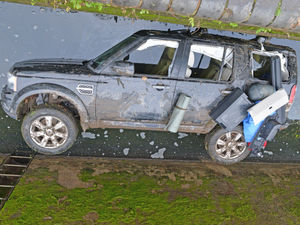 Supporting image for story: Recovery mission begins to remove car stuck in Black Country canal lock 