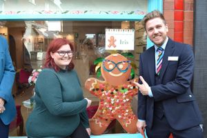 Zoe Witham from Mincher Lockett & Co Opticians with Dan Nutt of Leek United Building Society's