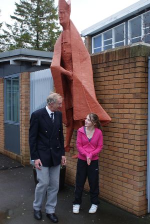 Bishop Gerard forms a backdrop to a 2009 visit to the college by Olympics athlete David Hemery, who is chatting to 6th form student Nerys Jones. 