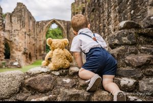 Elliot Short, two, from St. Georges with his Merrythought bear at Lilleshall Abbey