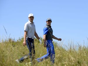 Jordan Spieth, left, and Rory McIlroy