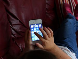 A child using a smartphone