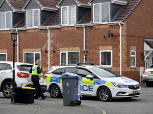 Police at the scene in Farley Road