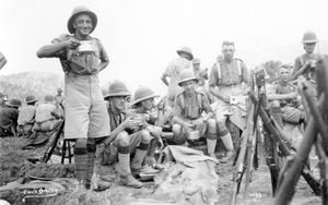 KSLI soldiers enjoying a brew, India, c.1920s. Written bottom left is 'Tundan' which could be location. Picture which was in an album among the effects of the late Mrs Frances Gittins (n.b. although called Frances her first name was actually Sarah) and relate to her husband Len Gittins' time in the Army during the 1920s and 1930s. Charles Leonard Gittins, Army no 4181167 served in the 1st Battalion of the King's Shropshire Light Infantry KSLI. He became a Sergeant. He died aged 55 in 1959. He lived and worked at that time at Donnington. The picture was donated by Mrs Gittins' daughters, Mrs Kathleen Pagett and Mrs Karen Taylor