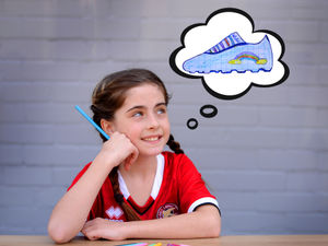 Supporting image for story: Walsall girl designs her rainbow football boots to raise money for NHS