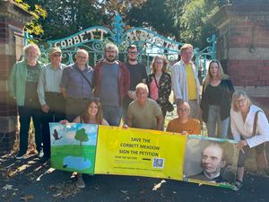 Descendants of John Corbett with members of the Corbett Meadow Action Group outside the old Corbett Hospital gates in Amblecote