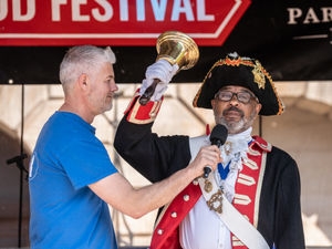 Rugeley town crier Adrian Basford gets the festival underway. Photo: Ian Knight / Z70 Photography