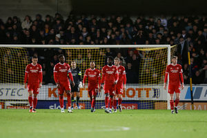 Shrewsbury Town players stand dejected after Beryly Lubala of Burton Albion scored a goal to make it 1-0 (AMA)