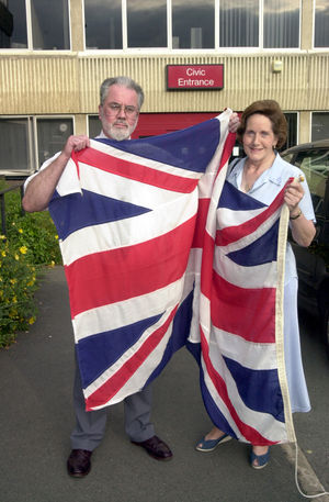 Councillors Miles Hosken and Jacqui Seymour make their feelings known before a council debate to discuss its flags policy.