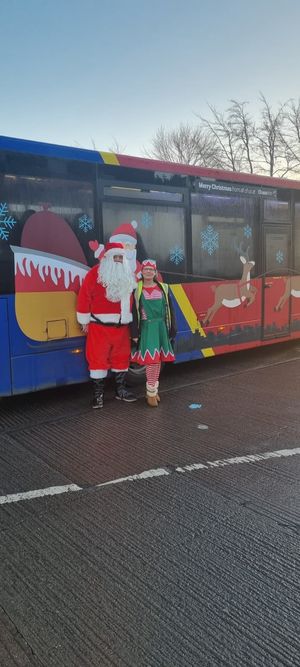 Santa and his helper wait to start their journeys around Cannock & Hednesford to help the Childrens Charity New Life.