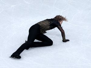 Supporting image for story: ‘Quad God’ falls to earth as Mikhail Shaidorov wins gold in figure skating drama