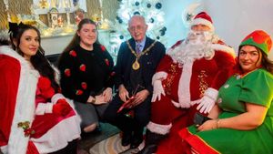 Walsall mayor with father Christmas at the milestone 