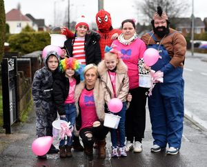 The Spinks family dressed up and held a fundraising walk for Mylee's family