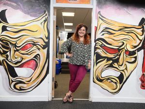 Supporting image for story: Empathy the key for academic coach helping children read and write