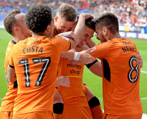 Conor Coady celebrates his goal