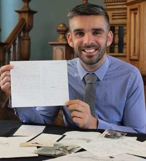 Aaron Dean with the letters which sold for £25,000.