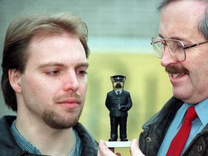 Supporting image for story: Flashback to 1995: Collectable figurine of crime-busting duo