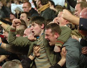 
Wolves fans show their delight after Karl Henry scores his winner.