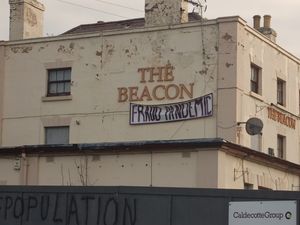 Supporting image for story: Covid jabs protest graffiti daubed on buildings in Telford