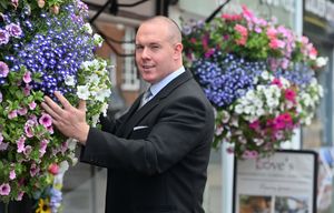 Stuart has kept up the tradition of planting hanging baskets outside Primrose Cottage