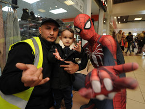 Meeting Spidermam, at Saddlers Shopping Centre, Walsall, Zayn Meah, with his father DK Meah, of Walsall..