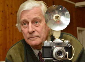 Mark Rigg as the photograher