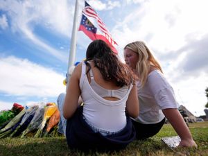 Supporting image for story: Father of Georgia school shooting suspect arrested on murder charge