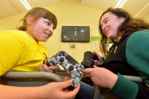 Summer Green, 11, with youth worker Charnie Roberts