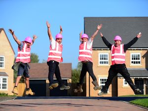 Supporting image for story: Shropshire builders don pink hard hats for breast cancer charity