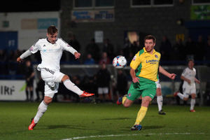 Adam Farrell of AFC Telford United fires a long range shot