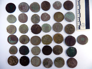 Supporting image for story: Hoard of Roman coins and brooch found in Shropshire declared treasure 