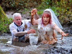 Supporting image for story: WATCH: A match made in mud as happy couple join in fun run
