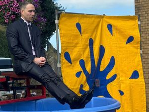 Supporting image for story: Watch: 'It was a shock every time!' Suited-up financial advisor gets dunked 80 times for charity