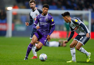 Josh Laurent of Shrewsbury Town and Adam Chicksen of Bolton Wanderers. (AMA)