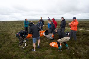 Members of the team mid-MINI construction.