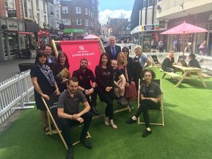 Businesses in Shoplatch celebrate the opening of the park