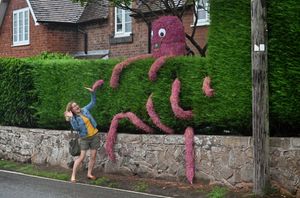Claire Kirk with one of the scarecrows