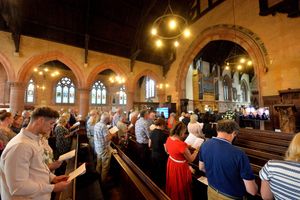 People taking part in the remembrance service which took place at St Leonard's Church