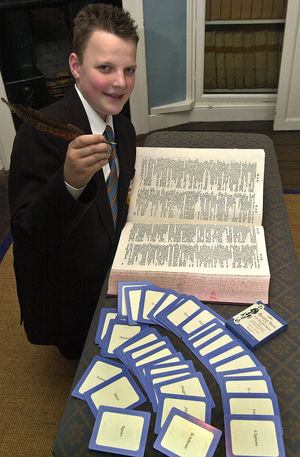In 2005 King Edward School pupil Josh Sanderson, aged 12, checks out a dictionary at the museum after winning a Samuel Johnson quiz.