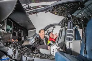 Dr Glen shows Mr Fletcher the inside of the helicopter