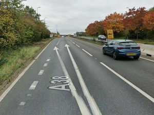 Supporting image for story: One lane of A38 closed as repair works halted due to flooding