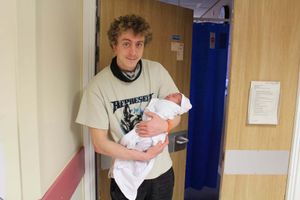 James Smith with his newly born second son Elliott