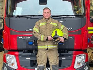 Supporting image for story: Hero off-duty firefighter rescues young boy trapped in house fire